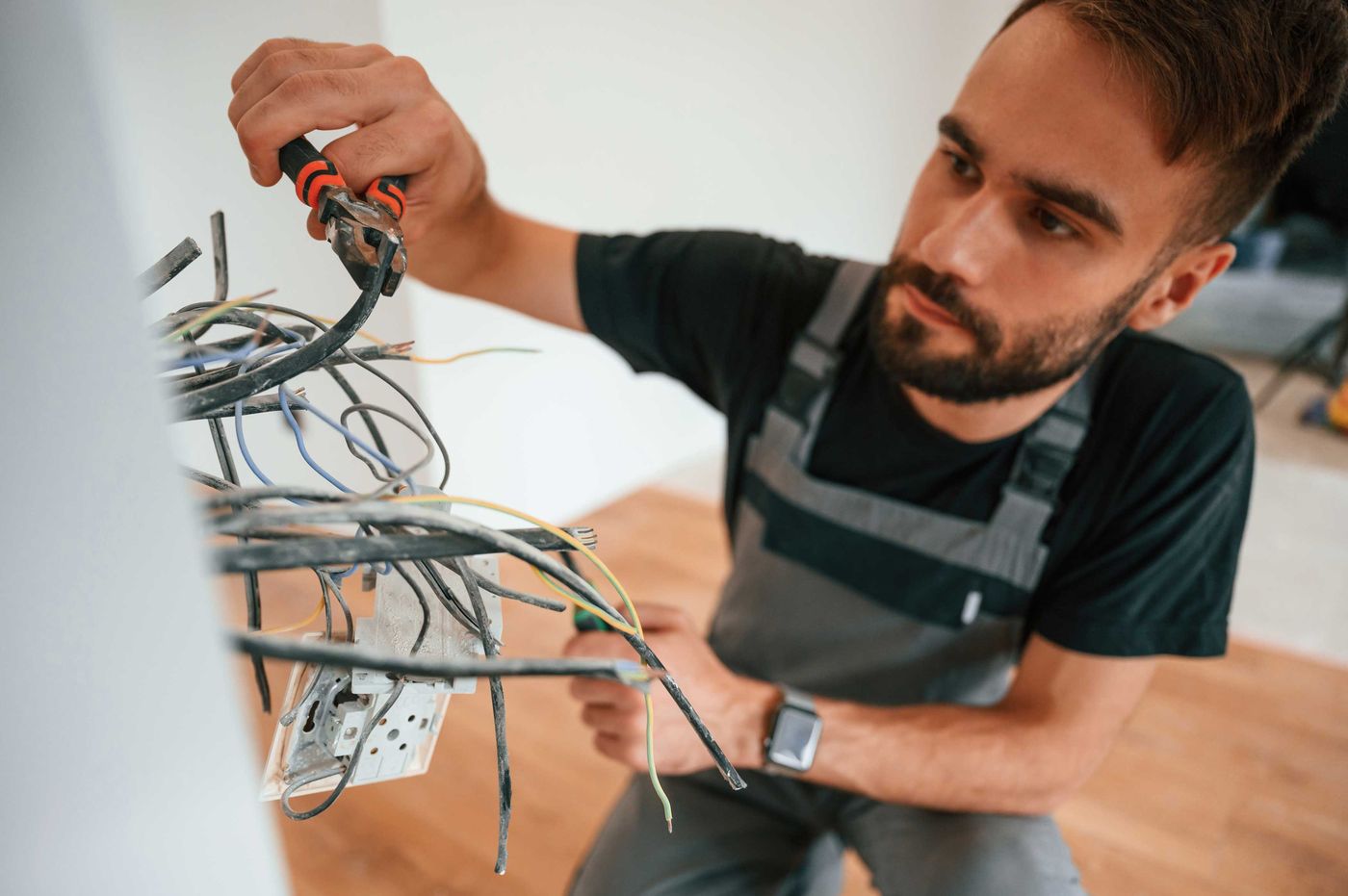 Electrician working on wiring